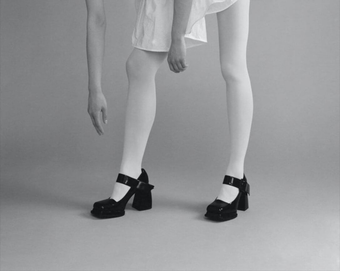 dress and shoes by SHUSHU/TONG, tights by JONATHAN ASTON