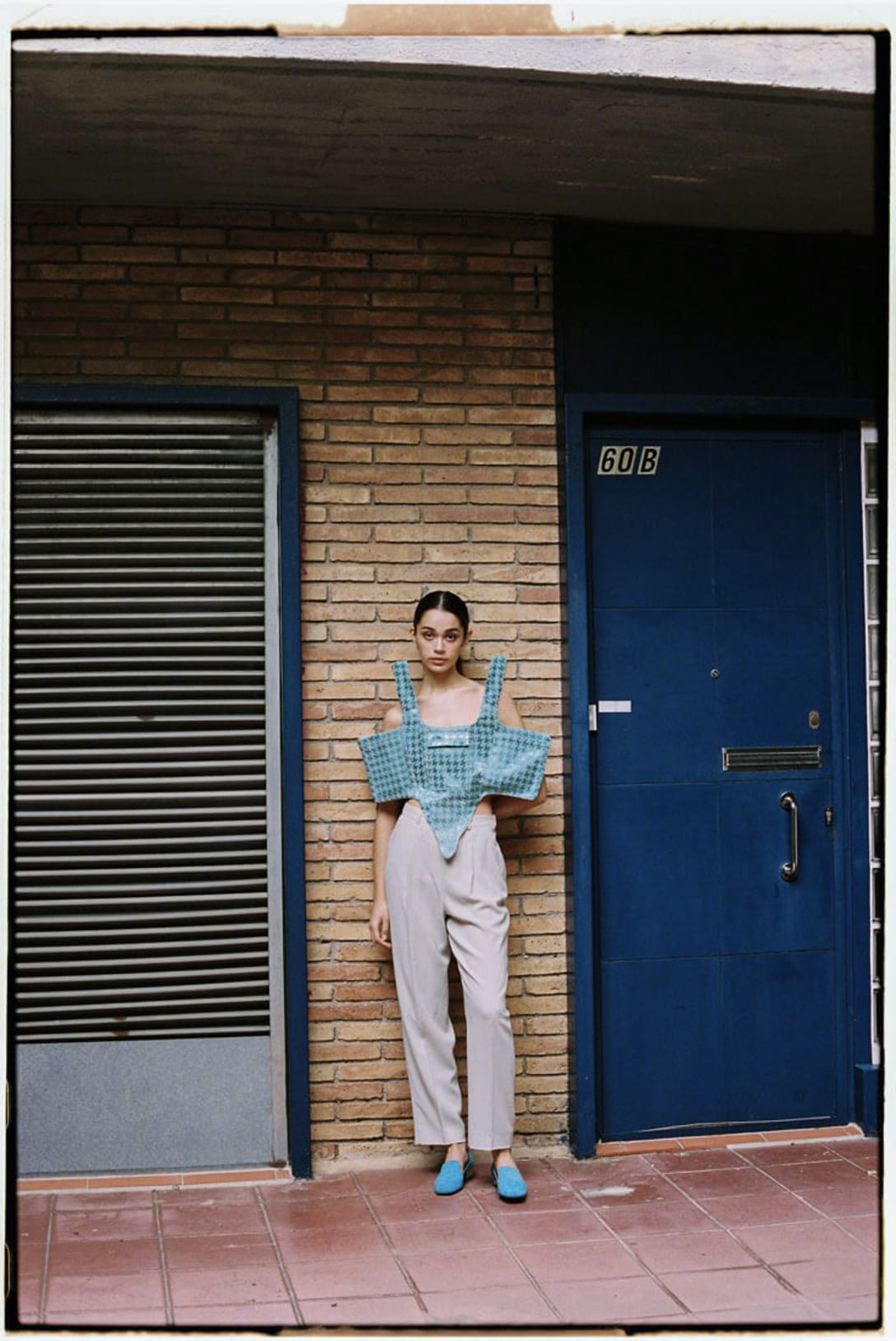 top by PETER SPOSITO STUDIO, trousers by CALVIN KLEIN, shoes by GUCCI