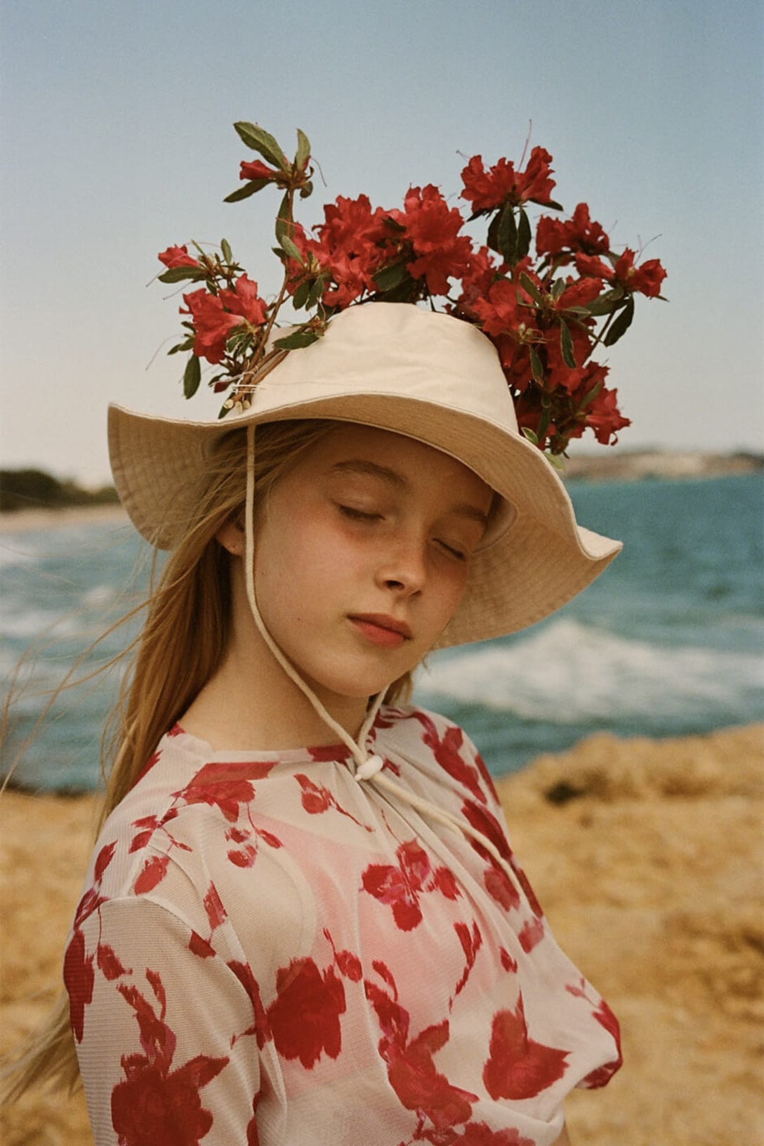 top and trousers by EIKŌ AI, hat by THE NEW SOCIETY