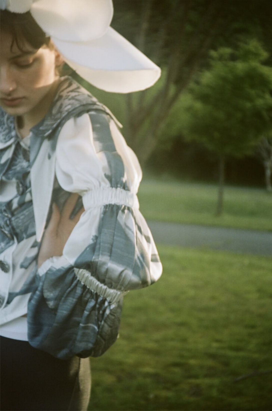 blouse by CHOPOVA LOWENA, headdress by KANA ISHIDA, shorts stylist’s own