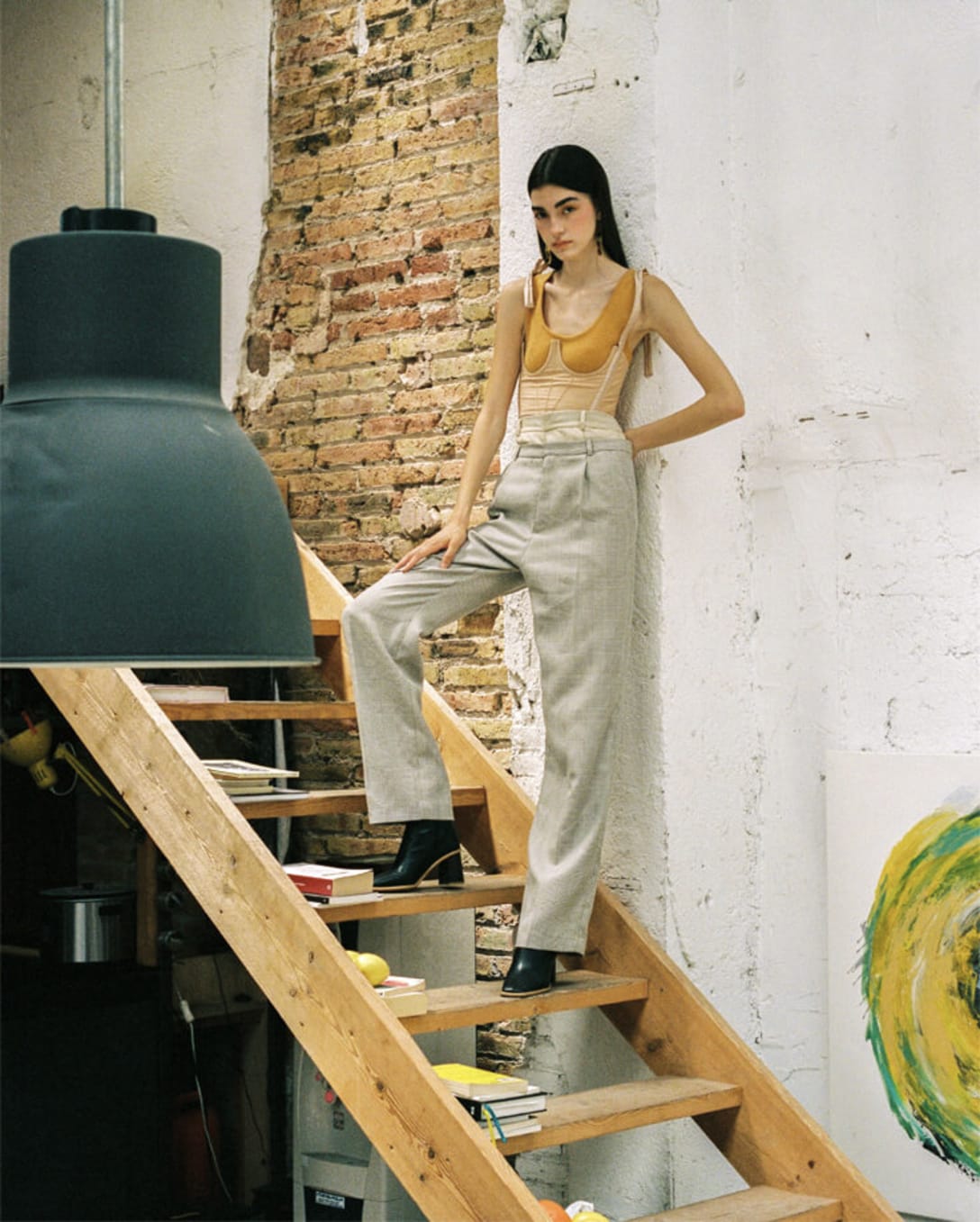 corset by GEORGIELA STUDIO, top and trousers by PABLO ERROZ, shoes by ALOHAS, earrings by MITUMI JOYAS