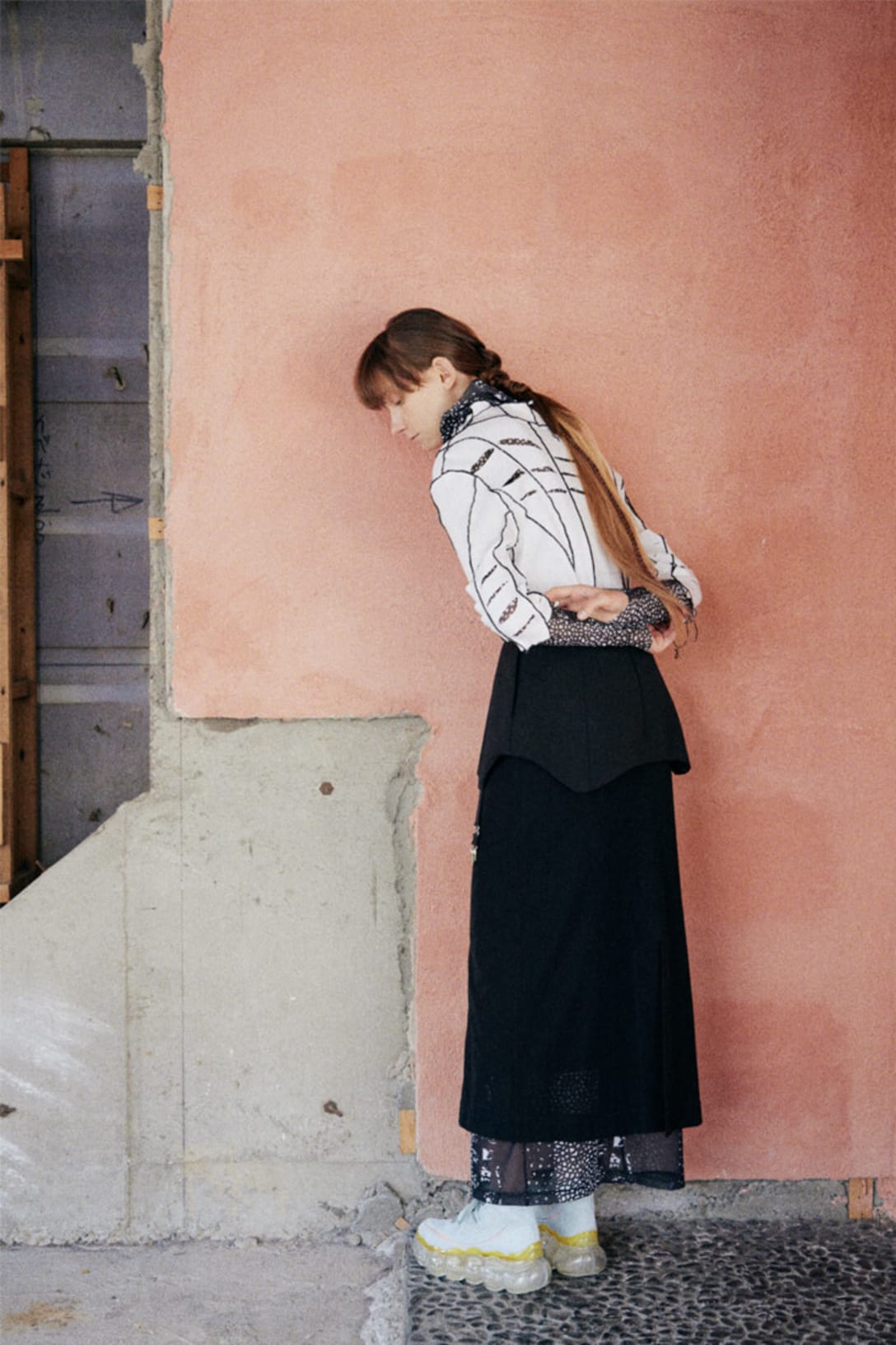 top, skirt and dress by AKIKO AOKI, shoes by GROUNDS, earrings by JOUETE
