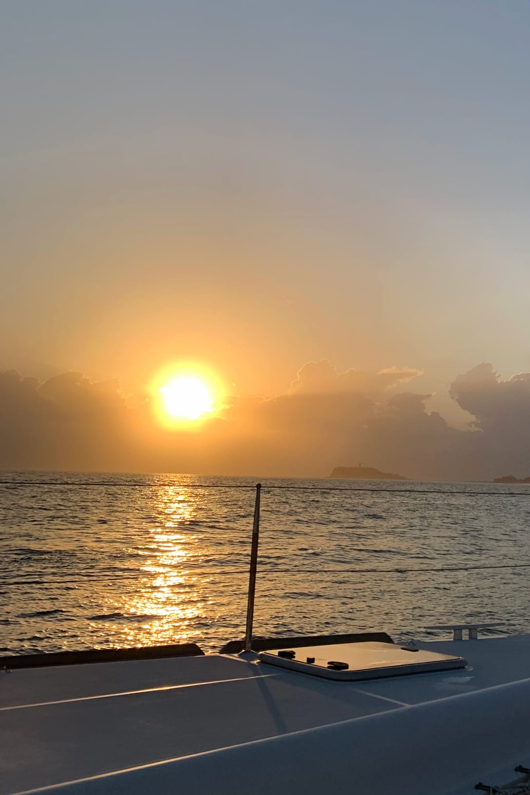 逗子の海に沈む夕陽 Image by FASHIONSNAP