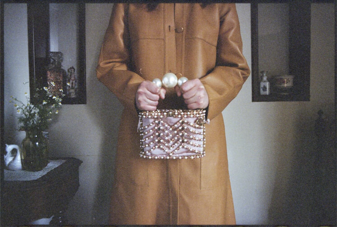 coat by LORO PIANA, bag by ROSANTICA